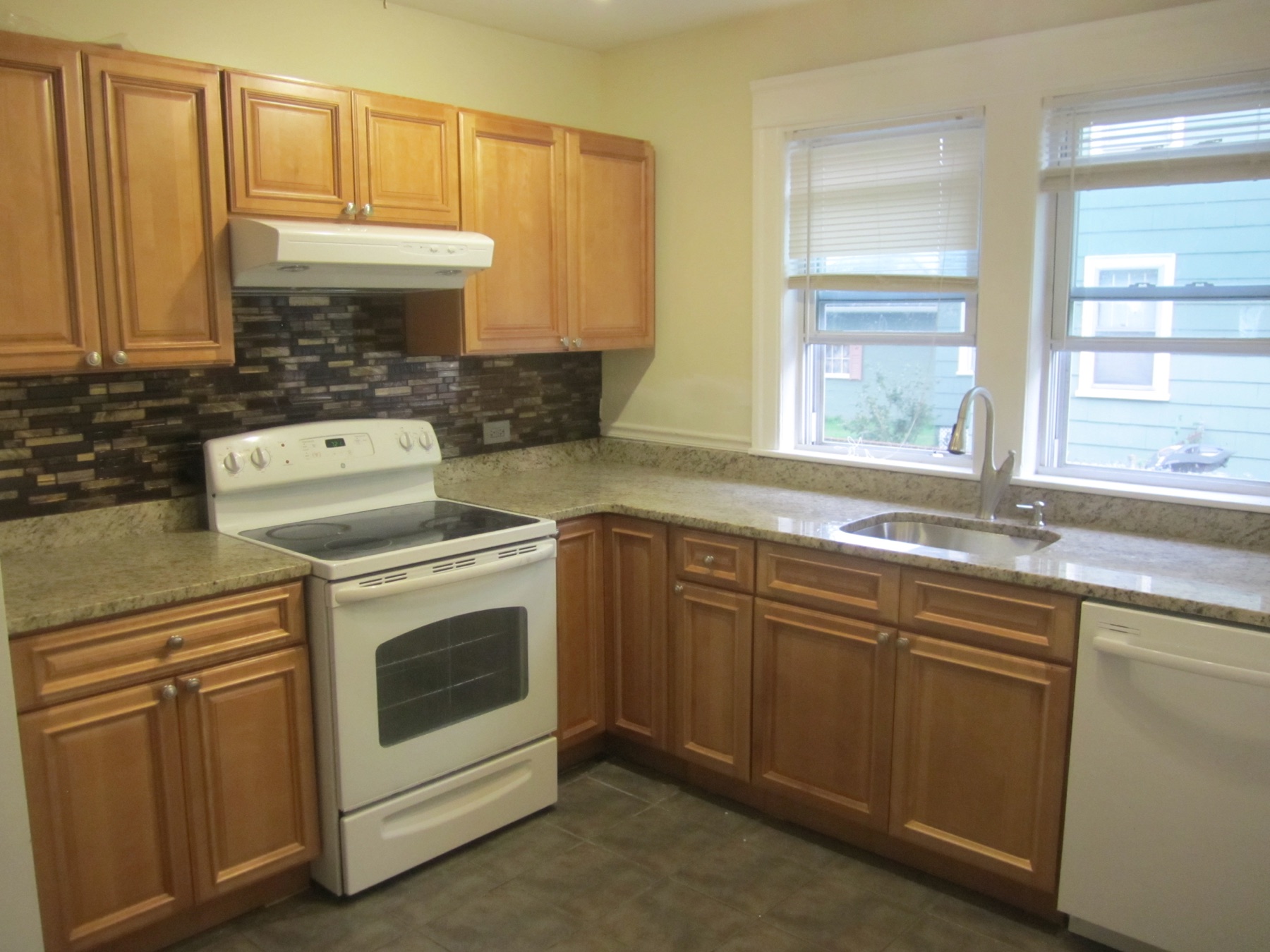 Updated kitchen with granite countertops at 148 Russell St #1