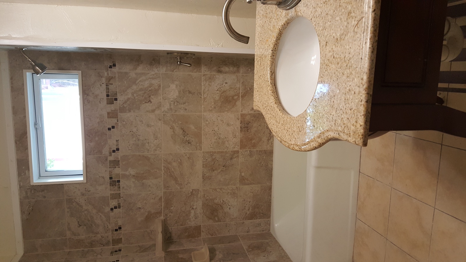Tiled bathroom at 28 Lancaster St #1R